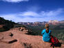 A hiker taking in the views of Red Rock Wilderness in Sedona.