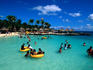 People swimming at Xcaret beach.