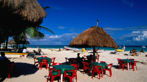 Thatched shade at the beach in Playa del Carmen.