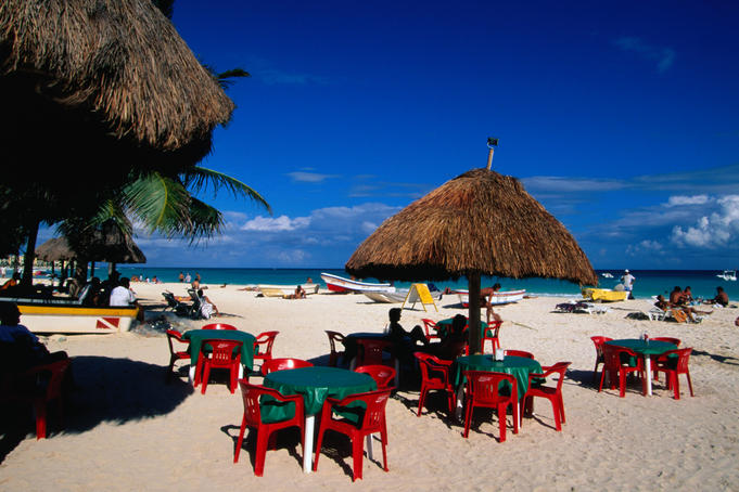 Thatched shade at the beach in Playa del Carmen.