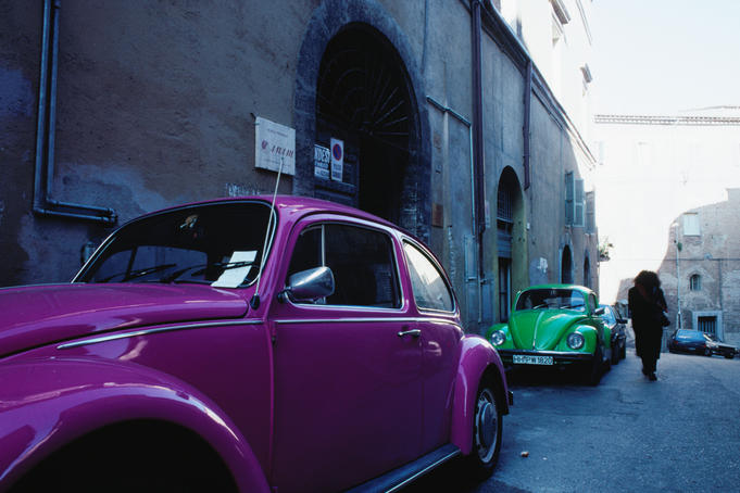 Cars parked along street.