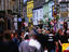 Crowds outside cafes and shops lining Quay St.