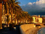 Palm tree-lined Boulevard Pascal Rossini and Plage Saint Francois, Old City.