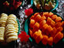 A tempting, colourful, tropical beakfast of paw paw, pineapple, guava, watermelon and garnished with hibiscus on Ko Phi-Phi Don