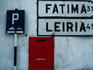 Street signs and letterbox in Tomar.