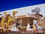 Historical mural on the Coles building.