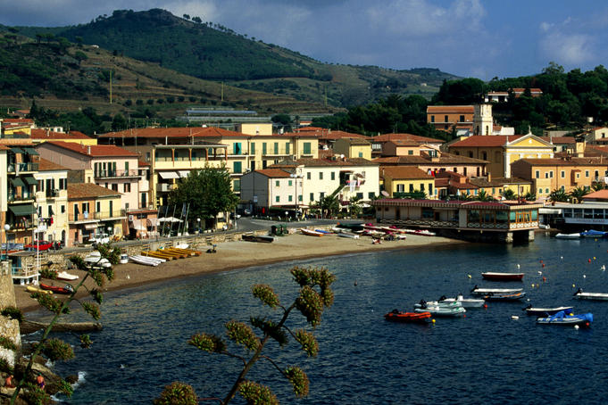 Town waterfront with moored boats.
