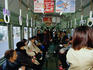 Passengers on board one of the oldest street cars in Kyoto.