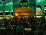 Live band at street cafe at night.
