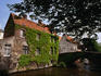 Canal running past house.