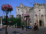 Horse and carriage passing Het Gravensteen, castle of Counts of Flanders.