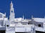 Rooftops and tower.