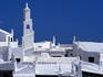 Rooftops and tower.