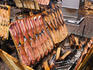 Smoked fish being prepared at Lapp fair.