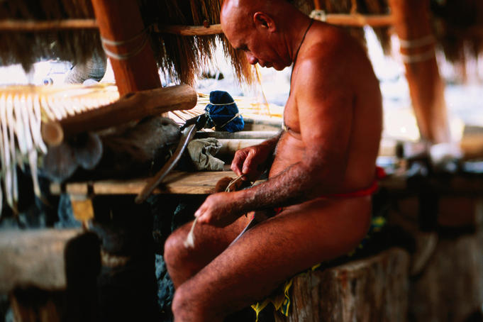 Canoe builder at work.