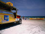 Yellow Jeepney on the beach.