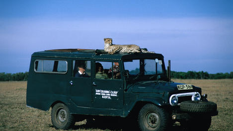 Safari jeep with cheetah, Kenya