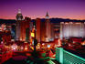 Birdseye view of New York New York and Monte Carlo hotels and casinos during evening subdued light.