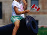 A small girl finds better use for an antique cannon in Quebec.