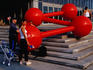 A young child playing on a sculpture outside the Centre de Sciences in the Old Town.
