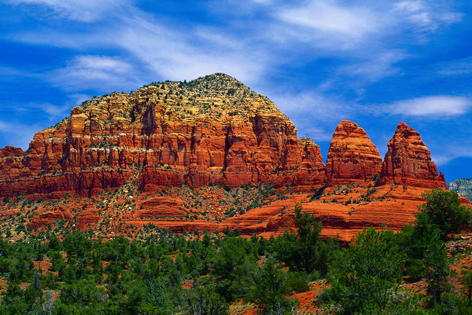 Rock formations with trees in foreground.