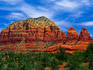 Rock formations with trees in foreground.