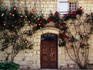 Roses climbing over front of house in the Loire Valley.