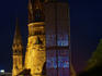 Gedaechtnis Kirche and Kaiser Wilhelm Church lit up at night.