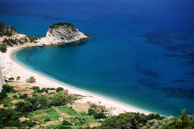 Sand and pebble beach of Potami near Karlovasi.