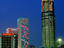 Illuminated city buildings.