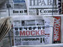 Russian newspapers, including Pravda and Moscow Evening News, at newsstand.