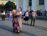 Old age pensioners dancing at Manezh Central Exhibition Hall on summer evening, around Manezhnaya.