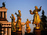 Golden statues of women from various former Soviet Republics surround fountain at All-Russian Exhibition Centre.