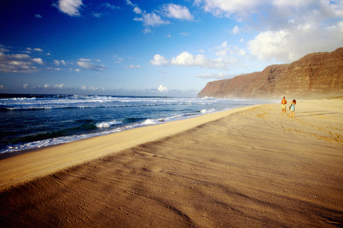 Couple on beach, Polihale State Park.