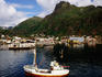 Overhead of town and fishing boat.