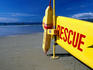 Yellow flotation device and surfski for beach rescue on Four Mile Beach in Port Douglas.