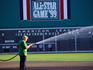 Groundskeeper tending Fenway Park in Boston.