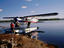 People boarding a seaplane for a flyfishing trip.