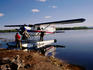 People boarding a seaplane for a flyfishing trip.