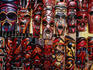 Craft for sale: carved wooden masks at a souvenir stall at Bruma Market World