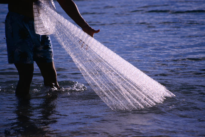 Pulling in the nets at Hukilau at the Paradise Cove Luau on the Waianae Coast.