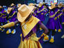 Marching girls participate in International District Parade.