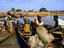 People unloading pirogues on the Bani River at Djenne's main northern entrance on Monday market day.