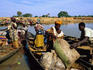 People unloading pirogues on the Bani River at Djenne's main northern entrance on Monday market day.