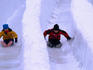 Children on snow slide during Winterlude, Jacques Cartier Park