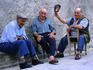 Elderly Sardinian men chatting in the village of Tuili.
