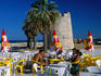 Old watch tower and bech cafe on Poetto Beach in Cagliari.