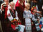 Traditionally-dressed children in main square.