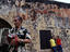 Man playing accordian at Castillo de San Christobel.