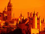 Historic buildings at sunset, with El Alcazar in foreground.